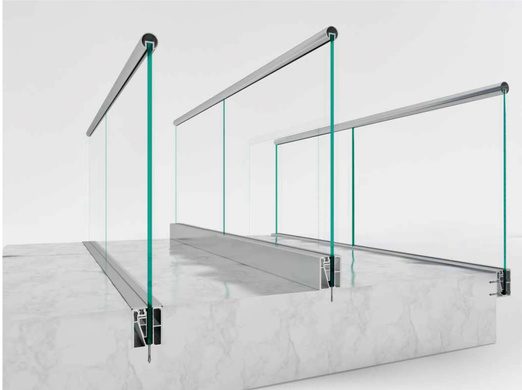 Glass set in a base channel with a slotted top rail