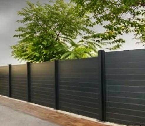 Grey privacy fence in a garden