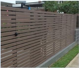 Brown timber tone horizontal slat fence