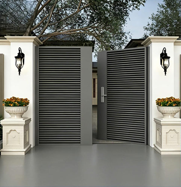 Grey louvre swing gates between white pillars