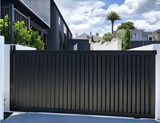 Black vertical slat sliding gate
