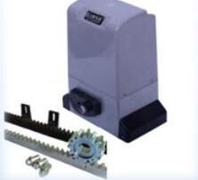 Sliding gate motor with a length of toothed rack