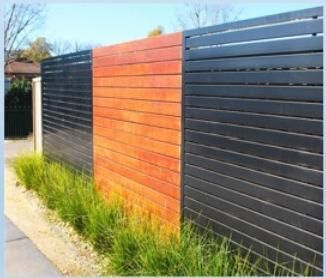 Privacy fence with a timber look feature panel