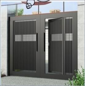 Black double swing gate in vertical slats with one leaf open