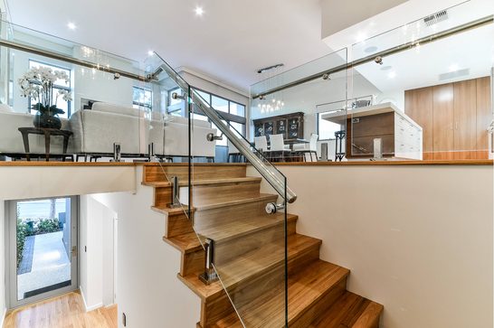 Spigot balustrade with round handrail on stairs