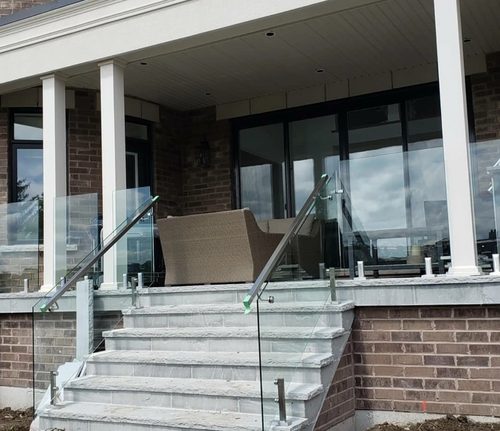 Glass on standoffs either side of entry steps